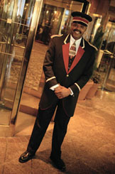 Man Standing at Entrance in Hotel